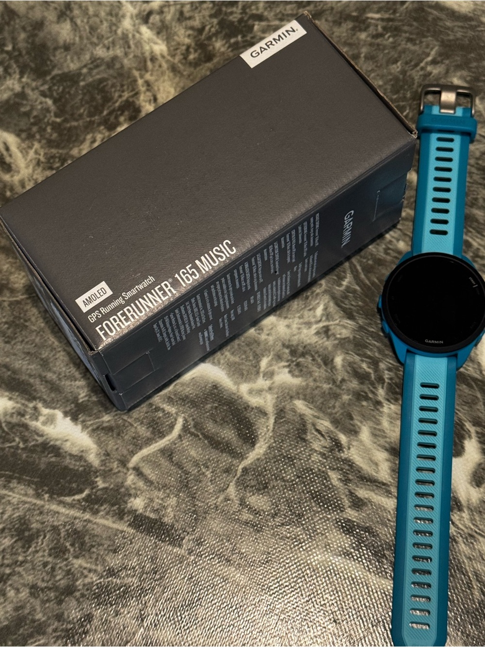garmin Forerunner 165 Music GPS Smartwatch - Teal/Blue Strap